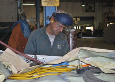 Worker wearing protection face shield